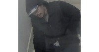 Man suspected of killing resident after stalking halls of Valley apartment building is arrested