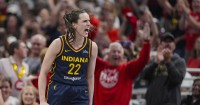 Caitlin Clark pushed to ground, and does some shoving of her own, during testy win over Sun