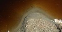 Efforts to reduce dust from dry Owens Lake bed are helping, report finds