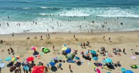 Triple-digit temperatures on deck as heat wave descends on SoCal, 'squashing' the marine layer