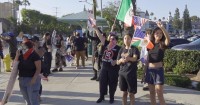 Vice president's rumored vacation visit to Disney resort sparks impromptu protest