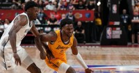 With LeBron James instructing him courtside, Bronny puts on a Summer League show