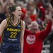 Caitlin Clark pushed to ground, and does some shoving of her own, during testy win over Sun