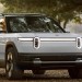 Rivian begins deliveries of cheaper electric vehicles